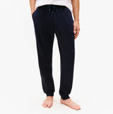Tommy Hilfiger TH Original Mens Logo Lounge Joggers Desert Sky front view showcasing cuffed legs and elasticated waistband.