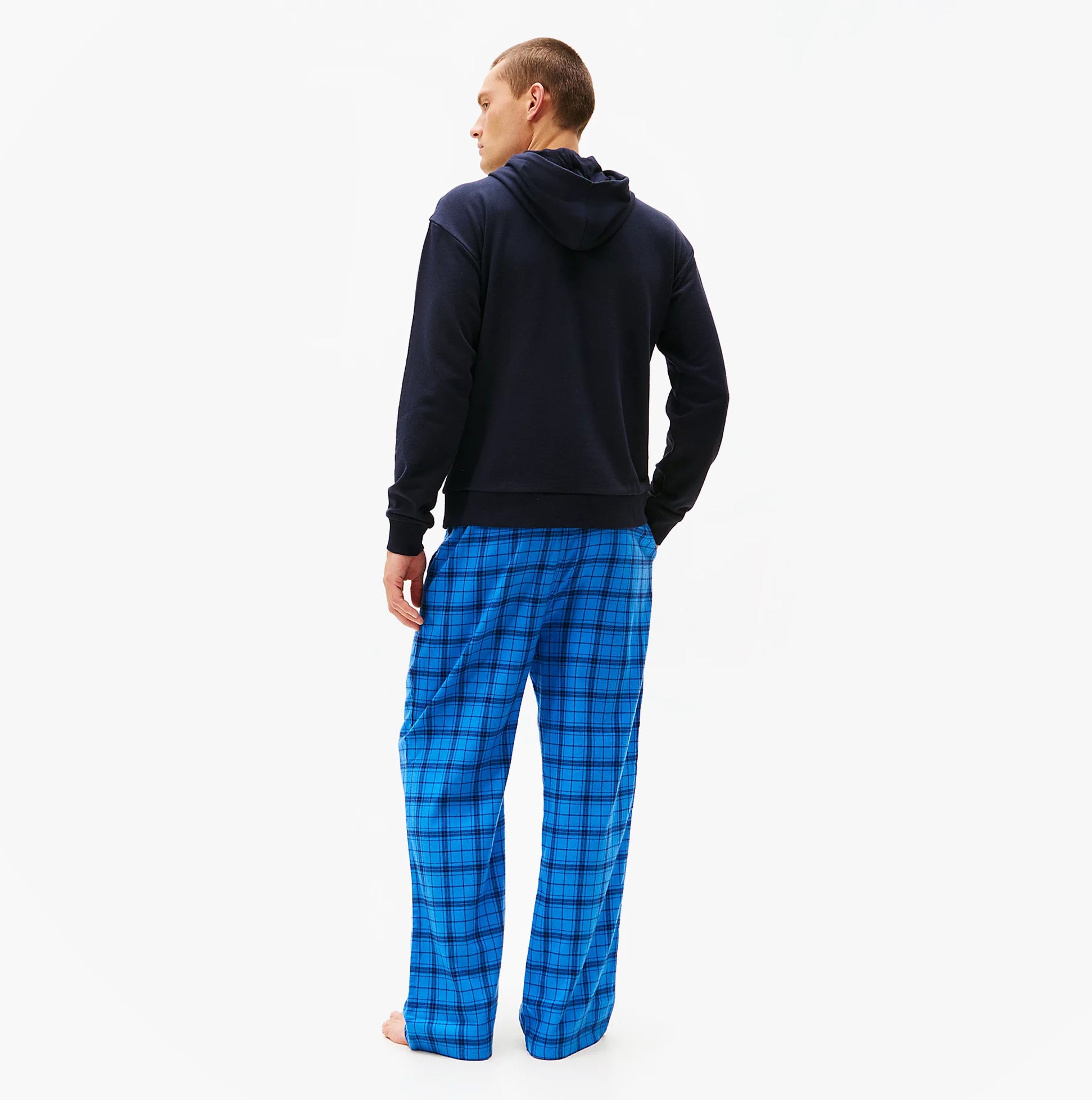 Tommy Hilfiger TH Original Logo Drawstring Lounge Hoodie Desert Sky back view on model wearing blue plaid pants.