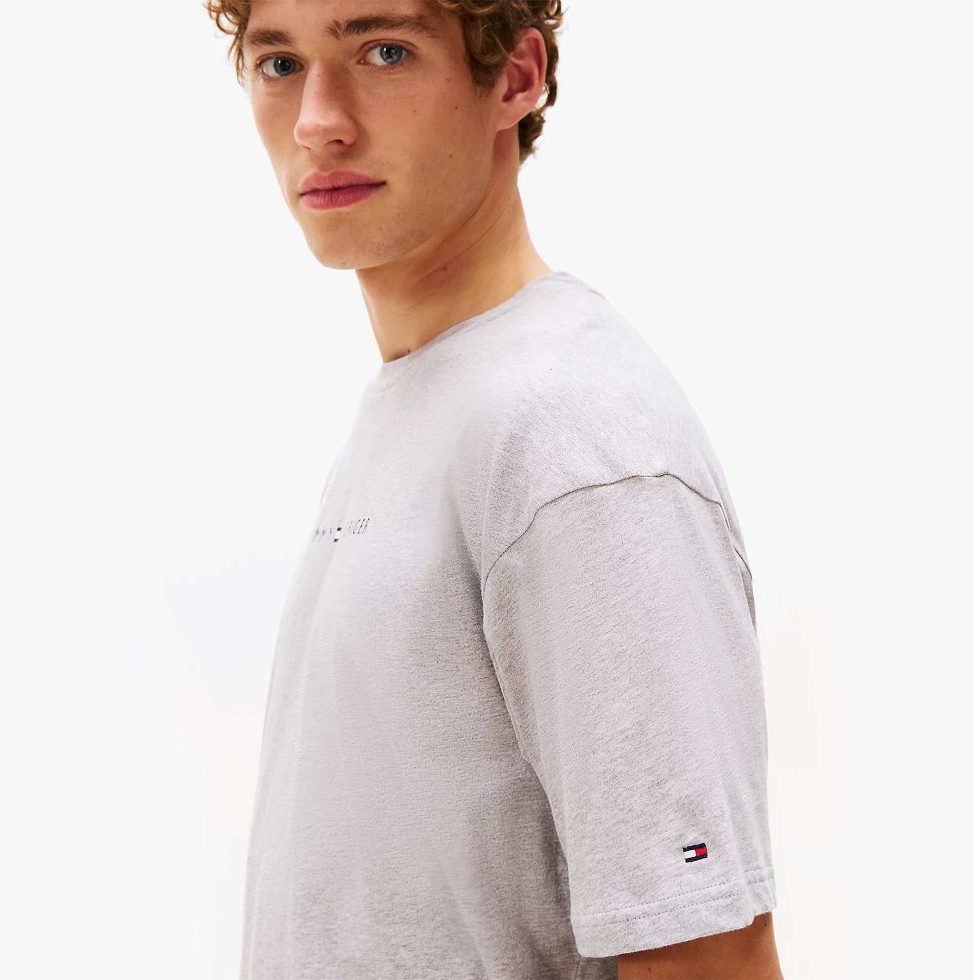 Tommy Hilfiger SS TEE CONT. LOGO Mens T-Shirts & Tank Tops Light Grey Heather side view model wearing the shirt