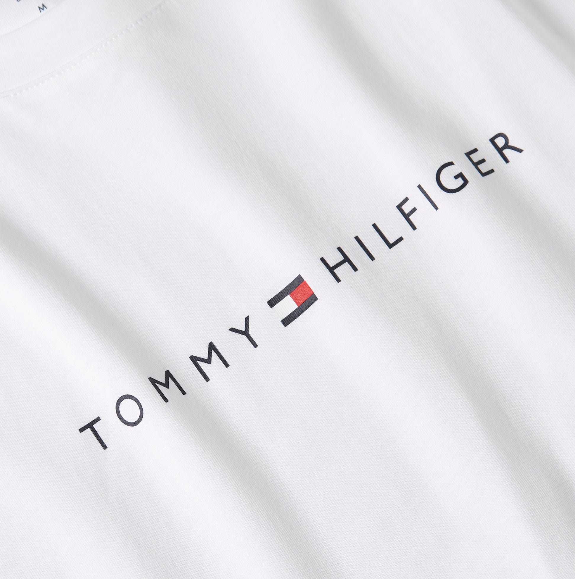 Tommy Hilfiger LOGO T-Shirt Mens Optic White detail view showing the logo design on cotton fabric.