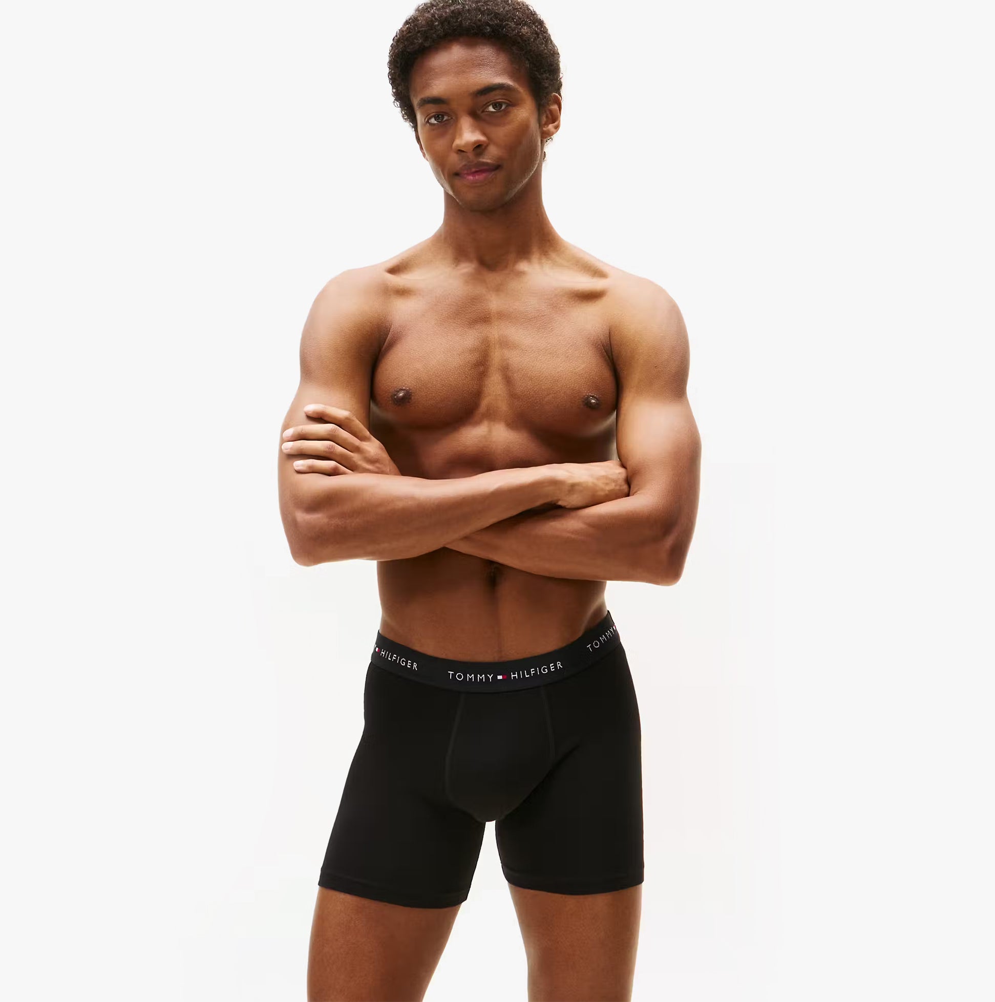 Tommy Hilfiger 3 Pack Mens BOXER BRIEF Multi front view on model showcasing black boxer briefs.