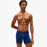 Tommy Hilfiger 3 Pack Mens BOXER BRIEF Multi front view on model wearing navy blue boxer briefs.