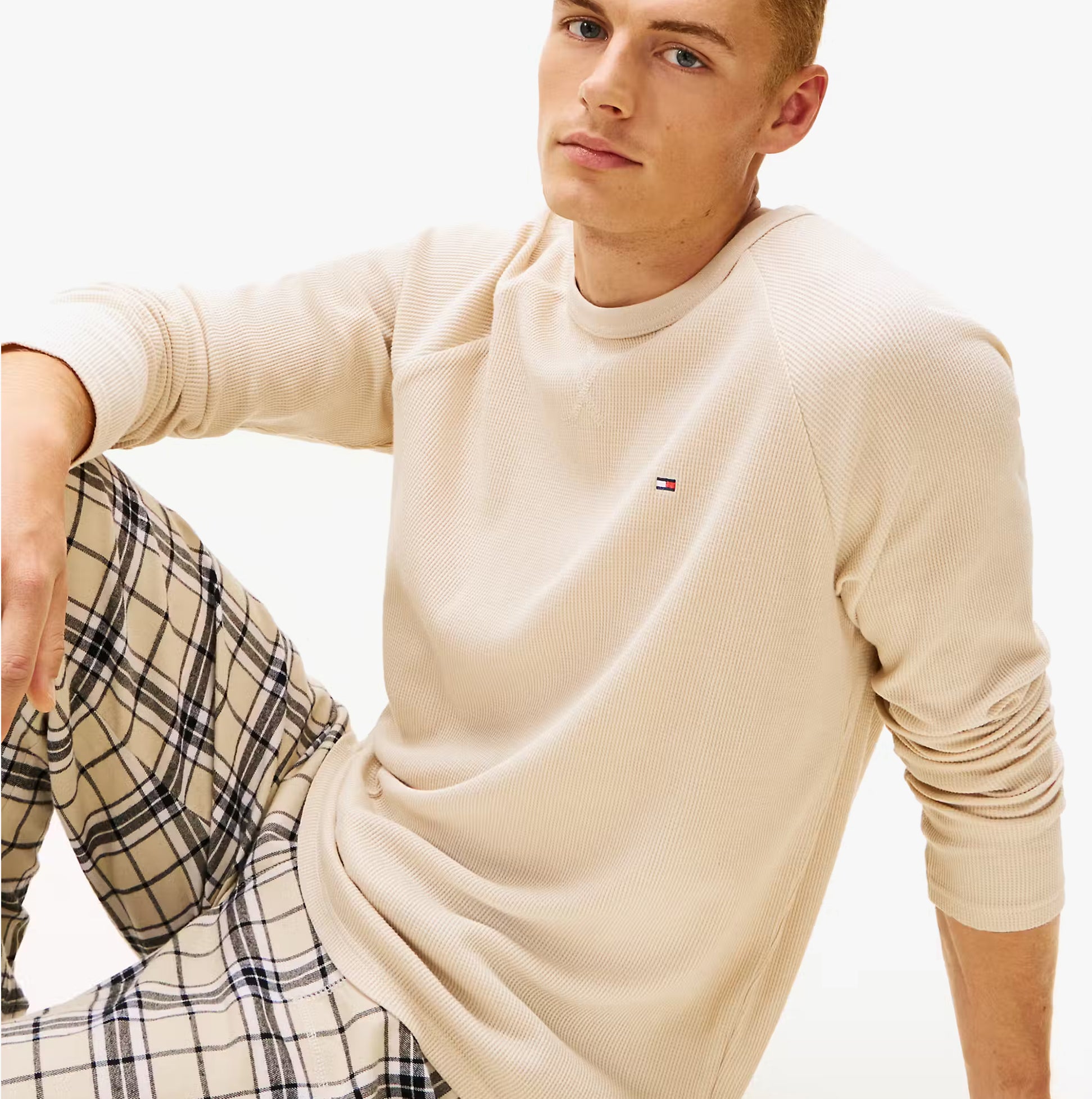 Tommy Hilfiger WAFFLE & PJ Mens Set Multicoloured front view with model in beige top and checkered pajama pants.