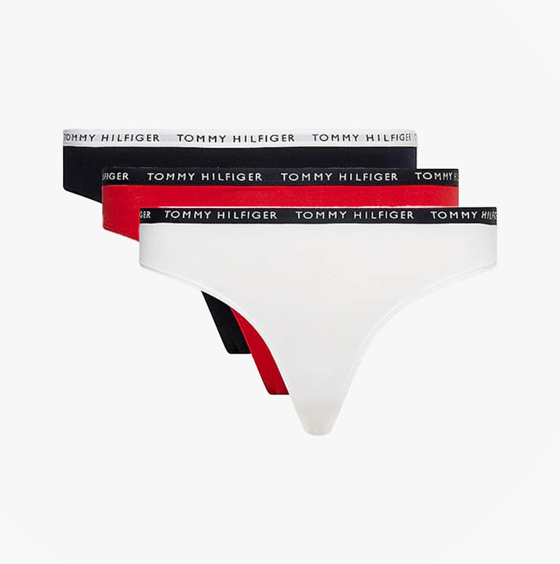 Tommy Hilfiger THONG 3 Pack Womens White/Desert Sky/Primary Red front view, featuring white, red, and black thongs with logoed waistbands.