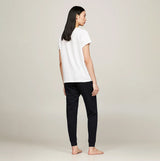 Tommy Hilfiger PURE COTTON Womens T-Shirt White back view, model wearing with black pants, showcasing style and fit.