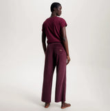 Tommy Hilfiger PANTS VELOUR Womens Pants Deep Burgundy back view model wearing pants.