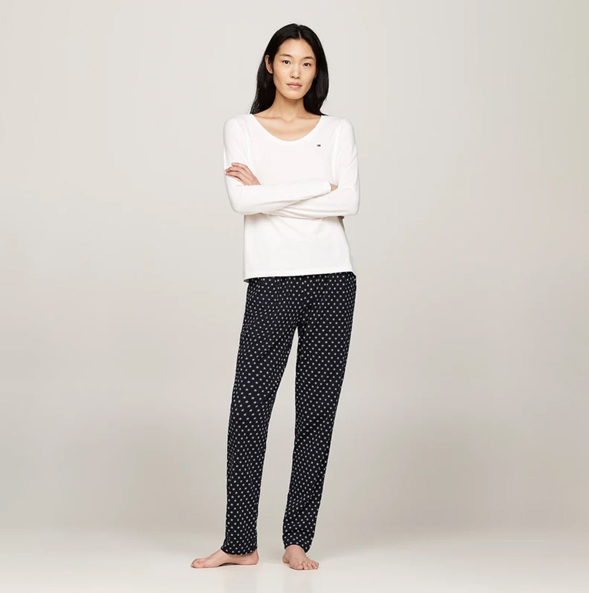Tommy Hilfiger ORIGINAL Womens Pyjama Set Ancient White/Star Navy front view, featuring a white top and navy polka dot bottoms.