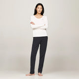 Tommy Hilfiger ORIGINAL Womens Pyjama Set Ancient White/Star Navy front view, featuring a white top and navy polka dot bottoms.