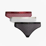 Tommy Hilfiger GIFT UNDERWEAR Womens 3 Pack Thongs Multicoloured front view showing red, white, and black thongs with logos.