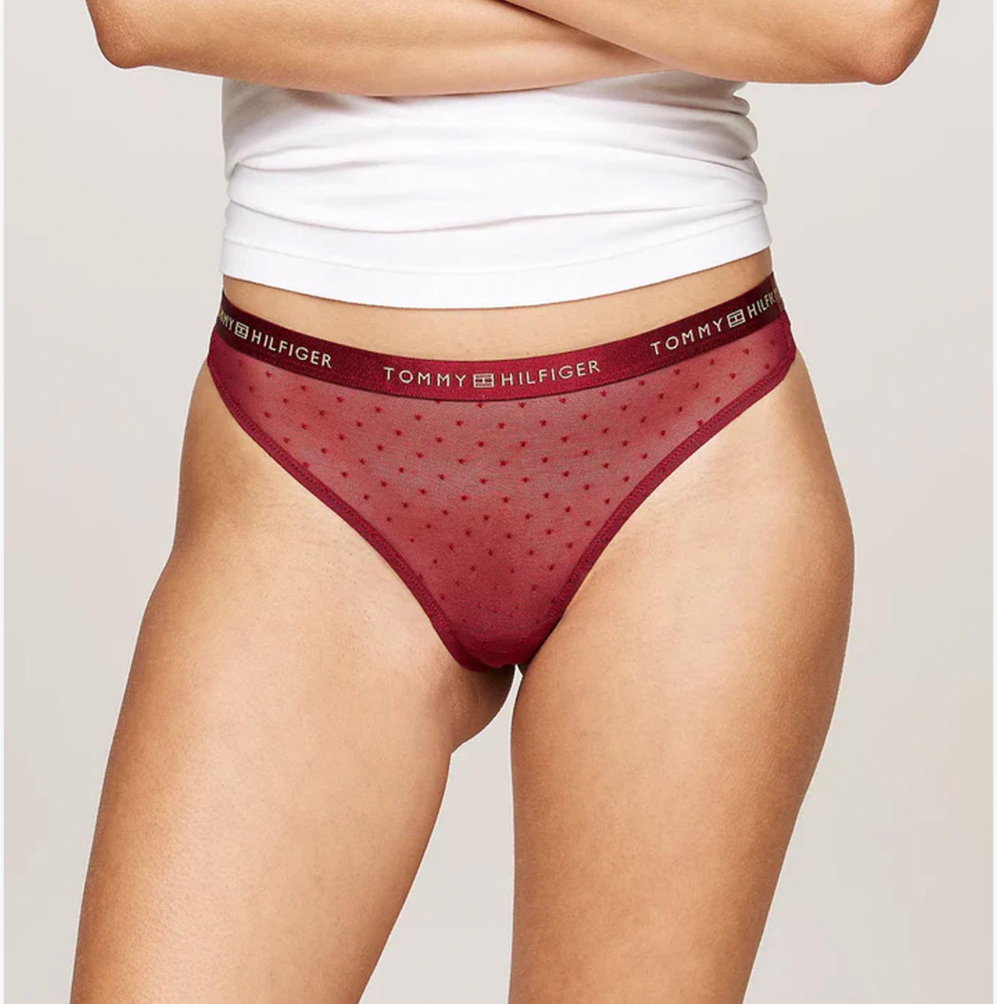 Tommy Hilfiger GIFT UNDERWEAR Womens 3 Pack Thongs Multicoloured side view of burgundy thong with logo waistband.