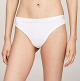 Tommy Hilfiger MONOTYPE Womens Thong White front view showing ribbed texture and TH logo elasticated waistband.
