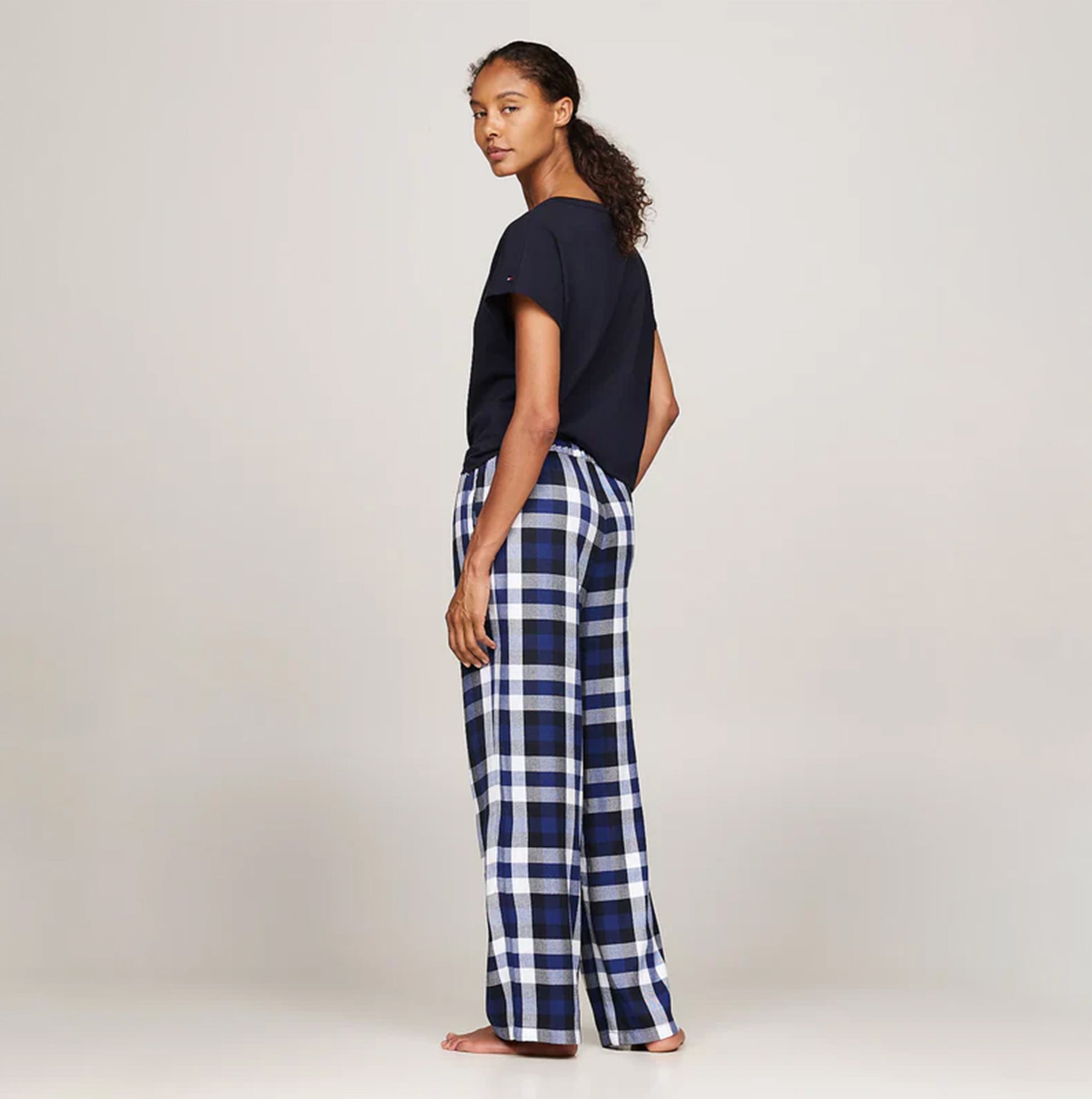 Tommy Hilfiger ORIGINAL Womens Flannel Pants Heritage Check Midi Blue Ink side view model wearing pants with navy top