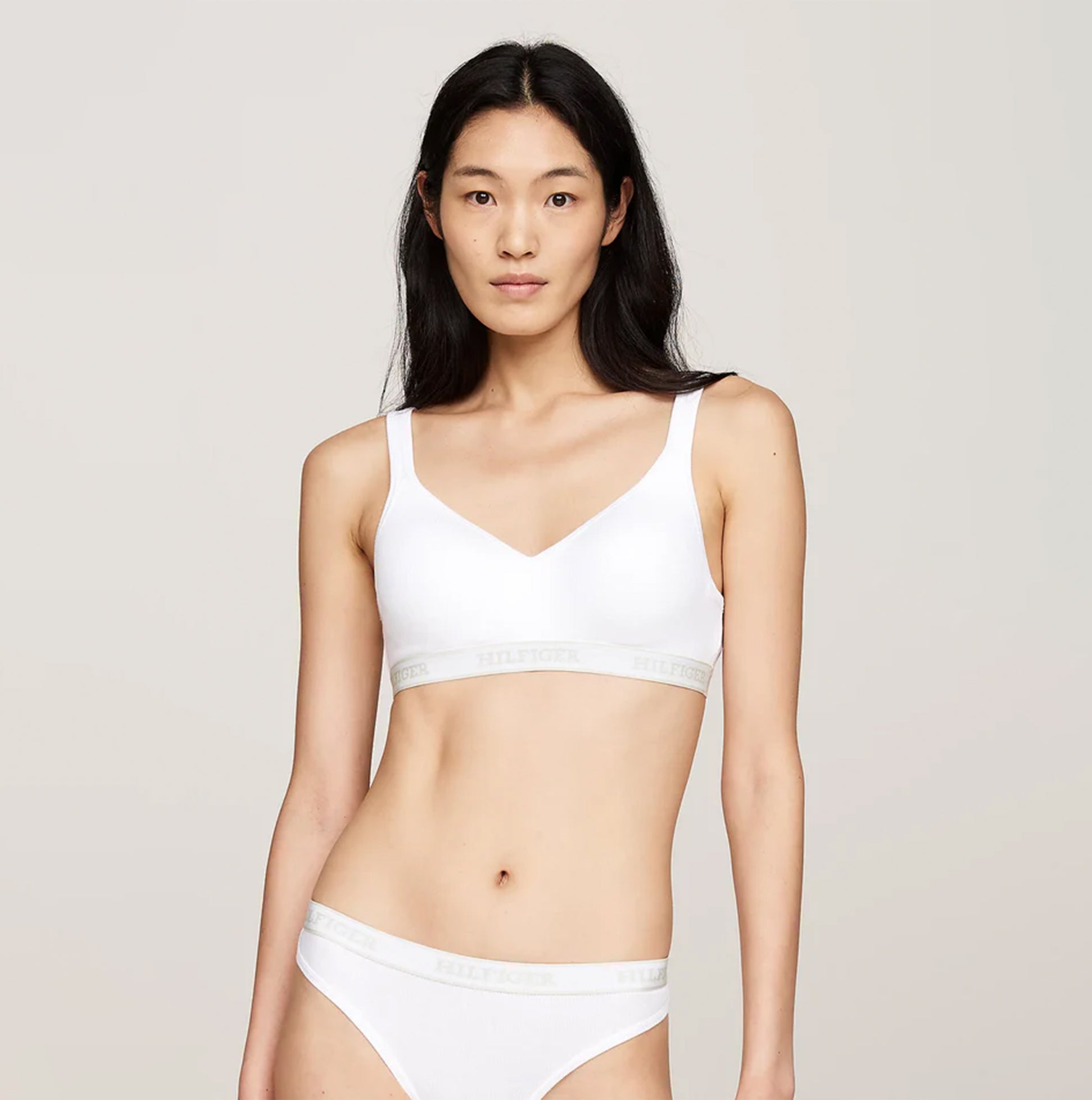 Tommy Hilfiger MONOTYPE Womens Bralette Lifts White front view showcasing the bralette with sweetheart neck and ribbed texture.