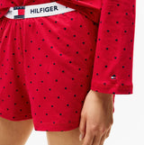 Tommy Hilfiger HERITAGE Womens Pyjama Set Hearts Primary Red Aop detail view of shorts with heart pattern and logo waistband.