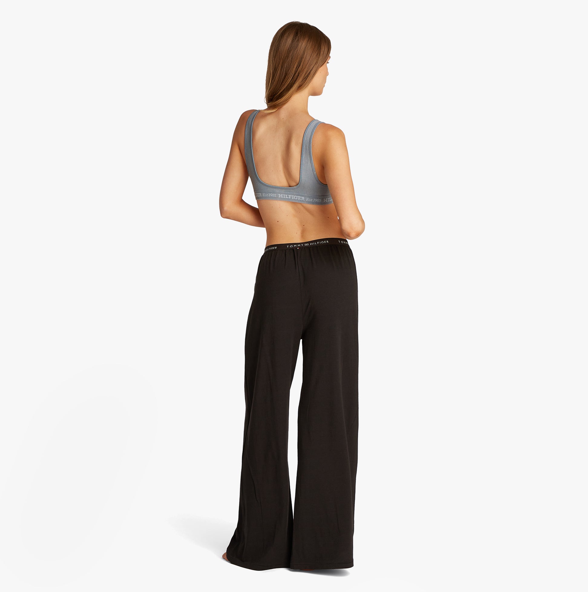 Tommy Hilfiger LOGO Womens Bralette Brisk Blue back view with matching black pants