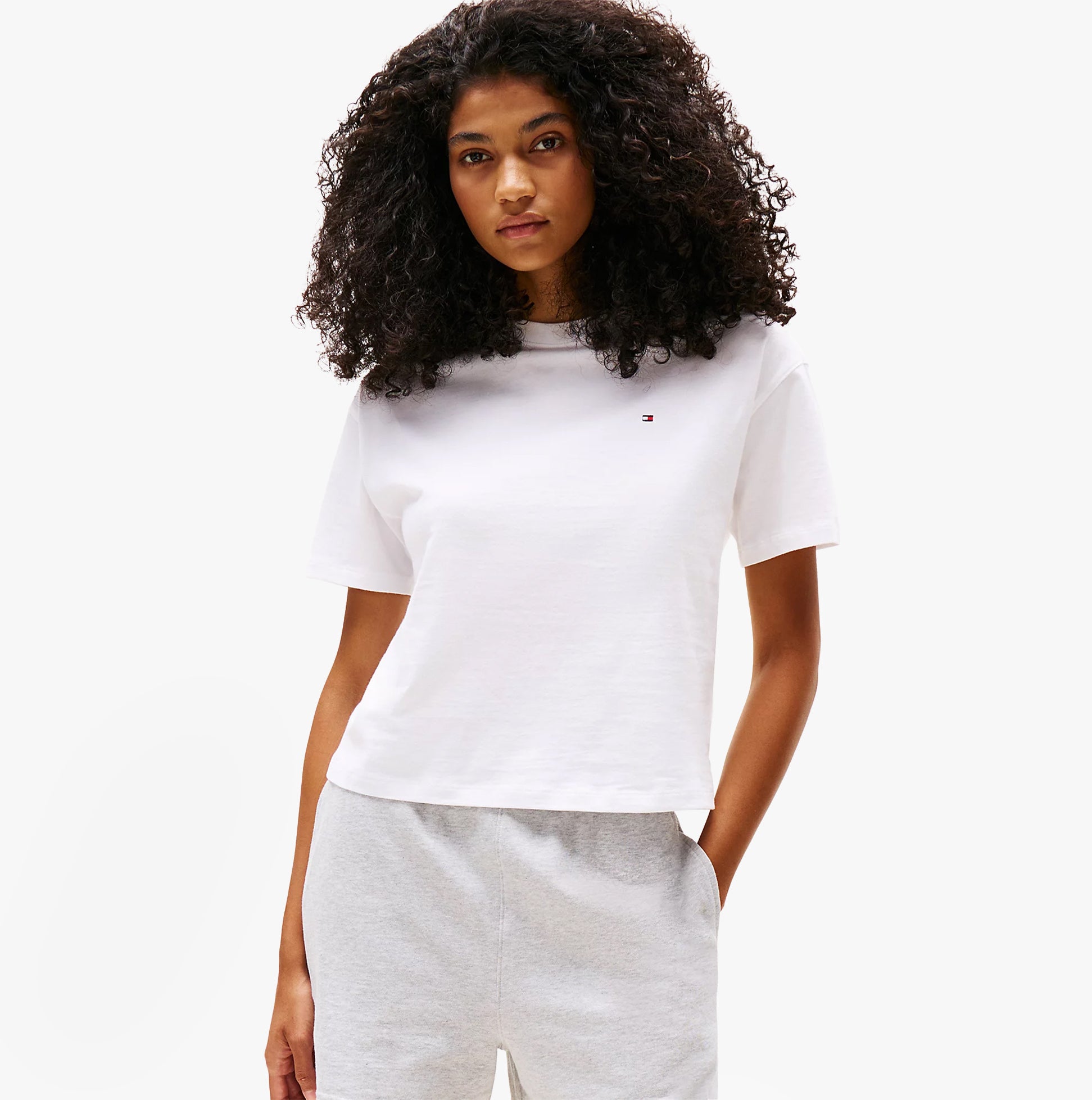 Tommy Hilfiger PURE COTTON Relaxed T-Shirt Womens White front view with model wearing it, showcasing crew neckline and short sleeves.