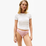 Tommy Hilfiger GIFT 3 PACK THONG Womens Thong Multicoloured shown on model in front view.