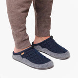 Toni Pons NADIR-UM Mens Mari blue mules side view worn with grey pants, comfortable and breathable slip-on slippers.