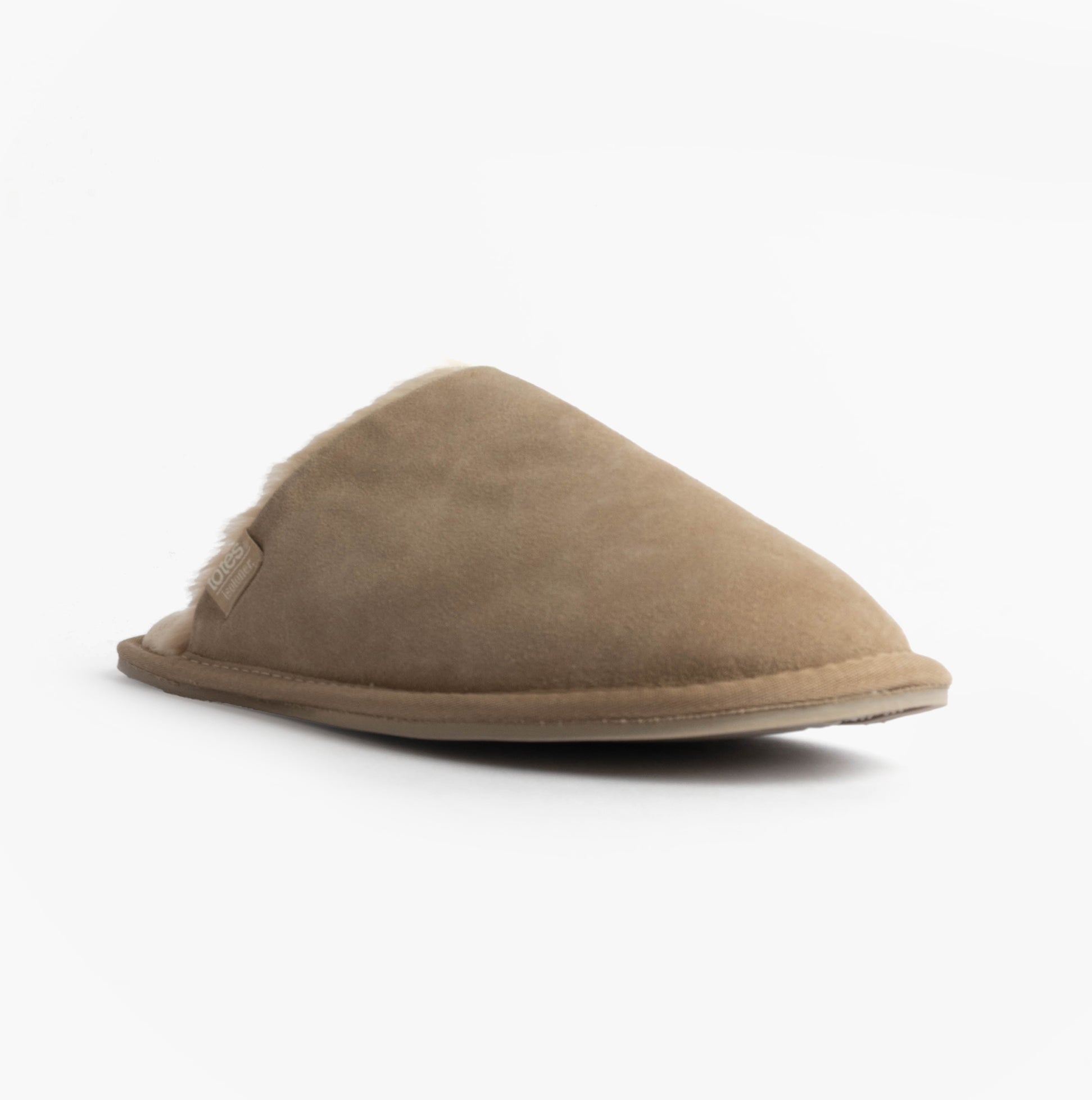 Totes Isotoner REAL SUEDE MULE Womens Slippers Sand side view showing soft suede design and round toe shape.