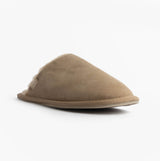 Totes Isotoner REAL SUEDE MULE Womens Slippers Sand side view showing soft suede design and round toe shape.