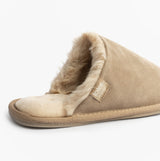 Totes Isotoner REAL SUEDE MULE Womens Slippers Sand side view showing suede upper and warm lining detail.