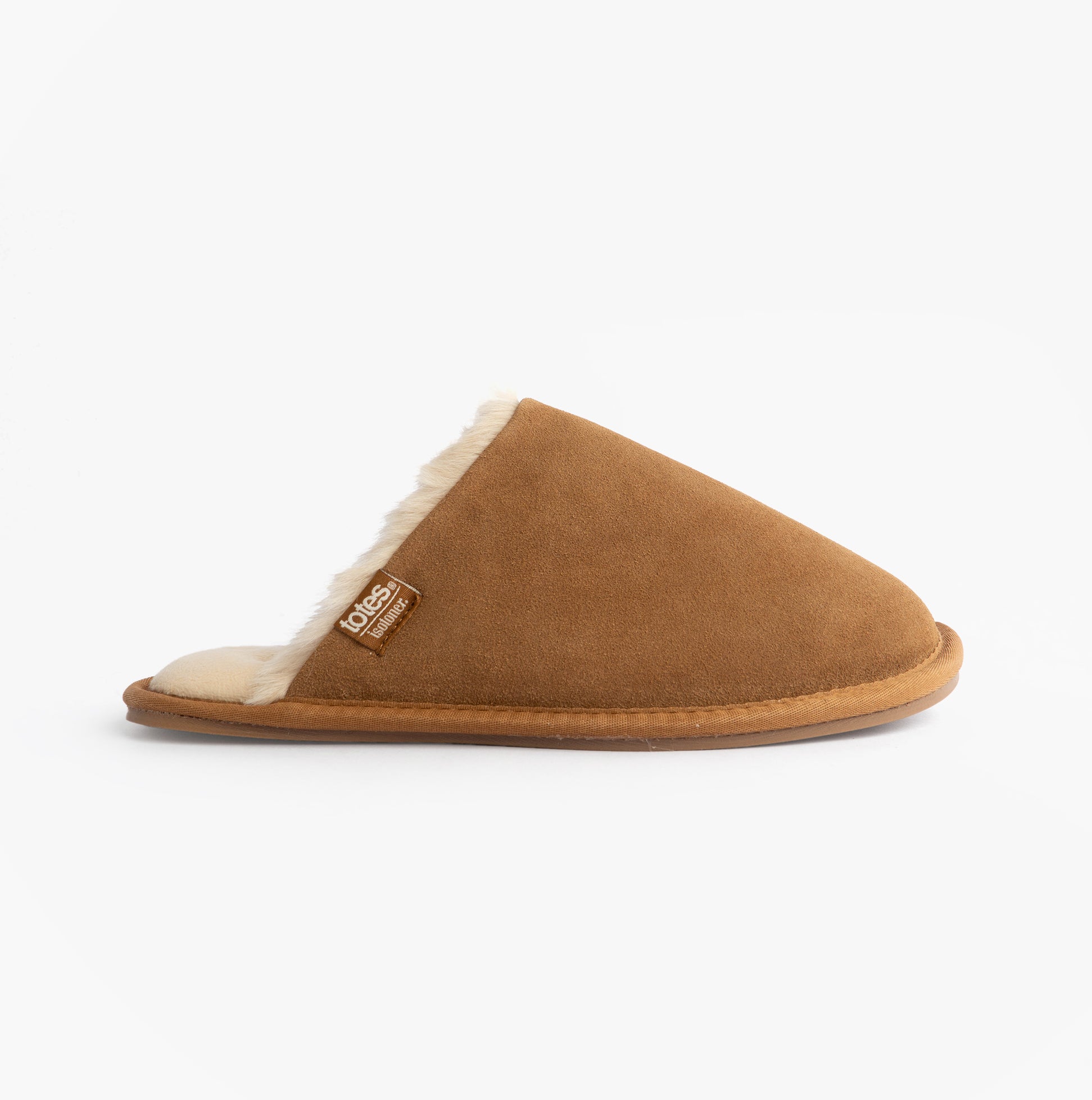 Totes Isotoner REAL SUEDE MULE Womens Slippers Tan side view, cozy suede with soft lining, slip-on design.