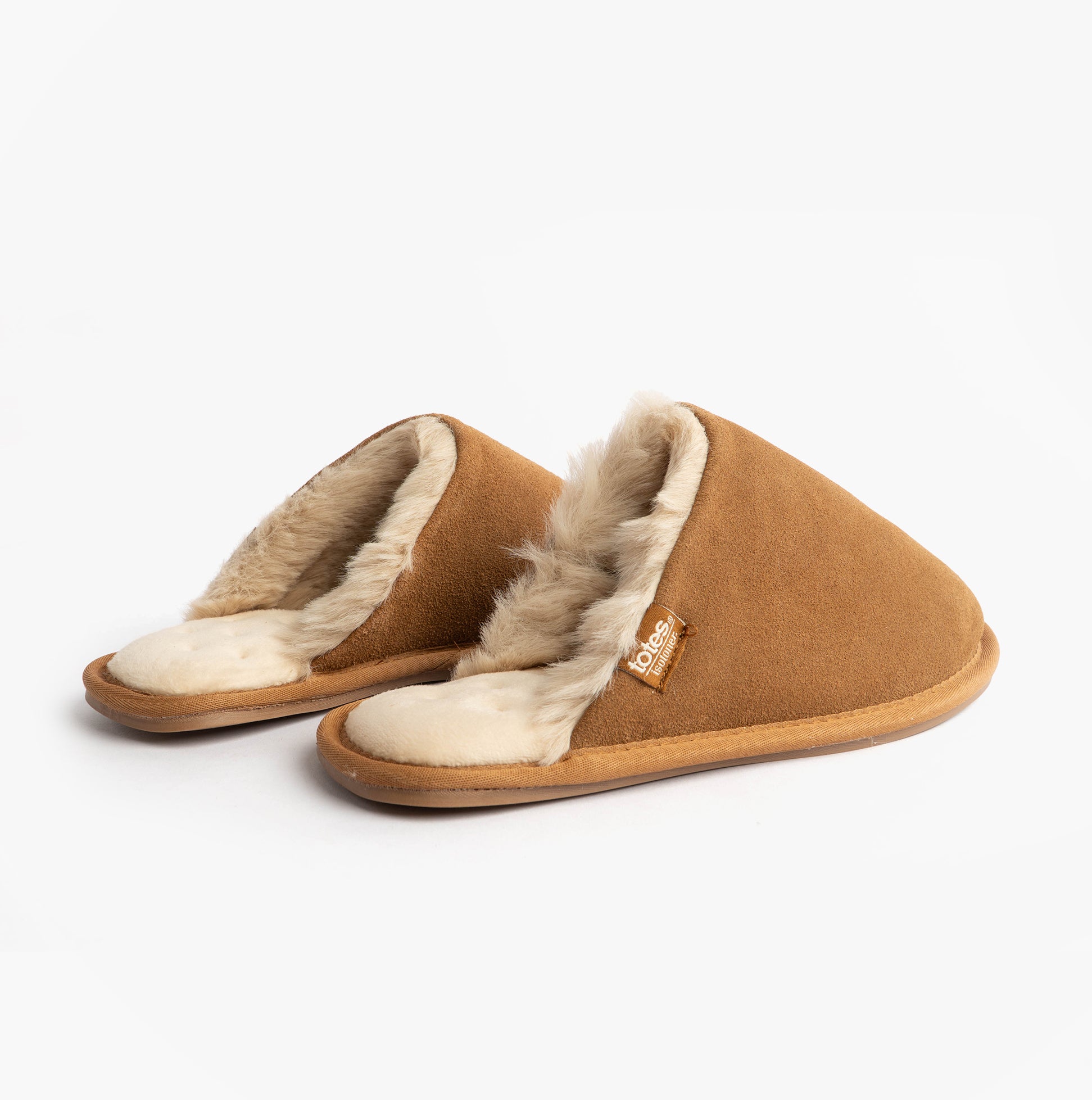 Totes Isotoner REAL SUEDE MULE Womens Slippers Tan side view showing soft suede and warm lining.