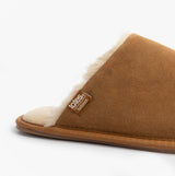 Totes Isotoner REAL SUEDE MULE Womens Slippers Tan side view showing soft suede upper and warm lining.