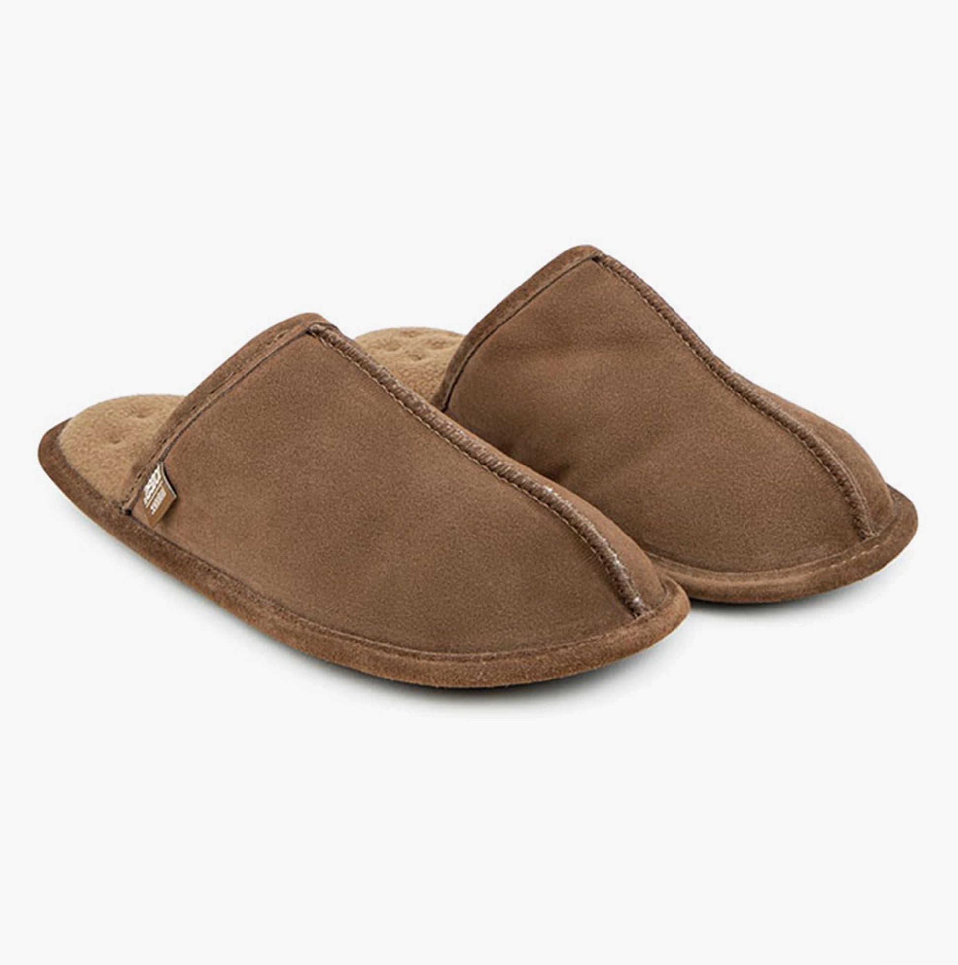 Totes Isotoner REAL SUEDE MULE Mens Memory Foam Slippers Tan side view showcasing soft suede upper and padded footbed.