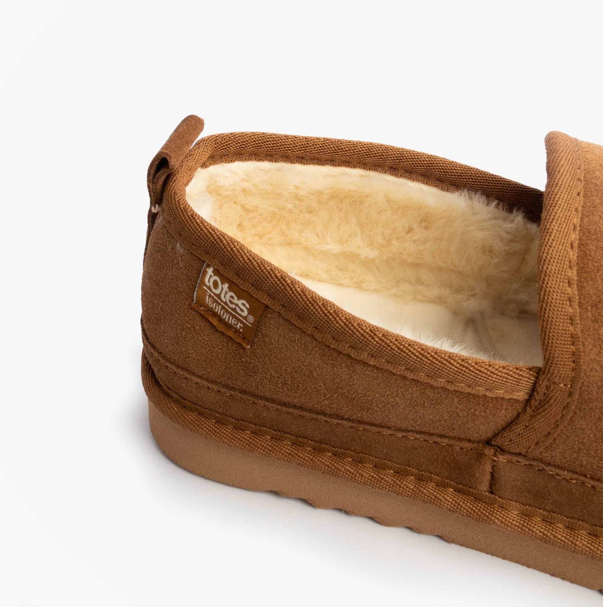 Totes Isotoner REAL SUEDE FULL BACK Mens Full Back Slippers Tan side view highlighting warm lining and suede texture.