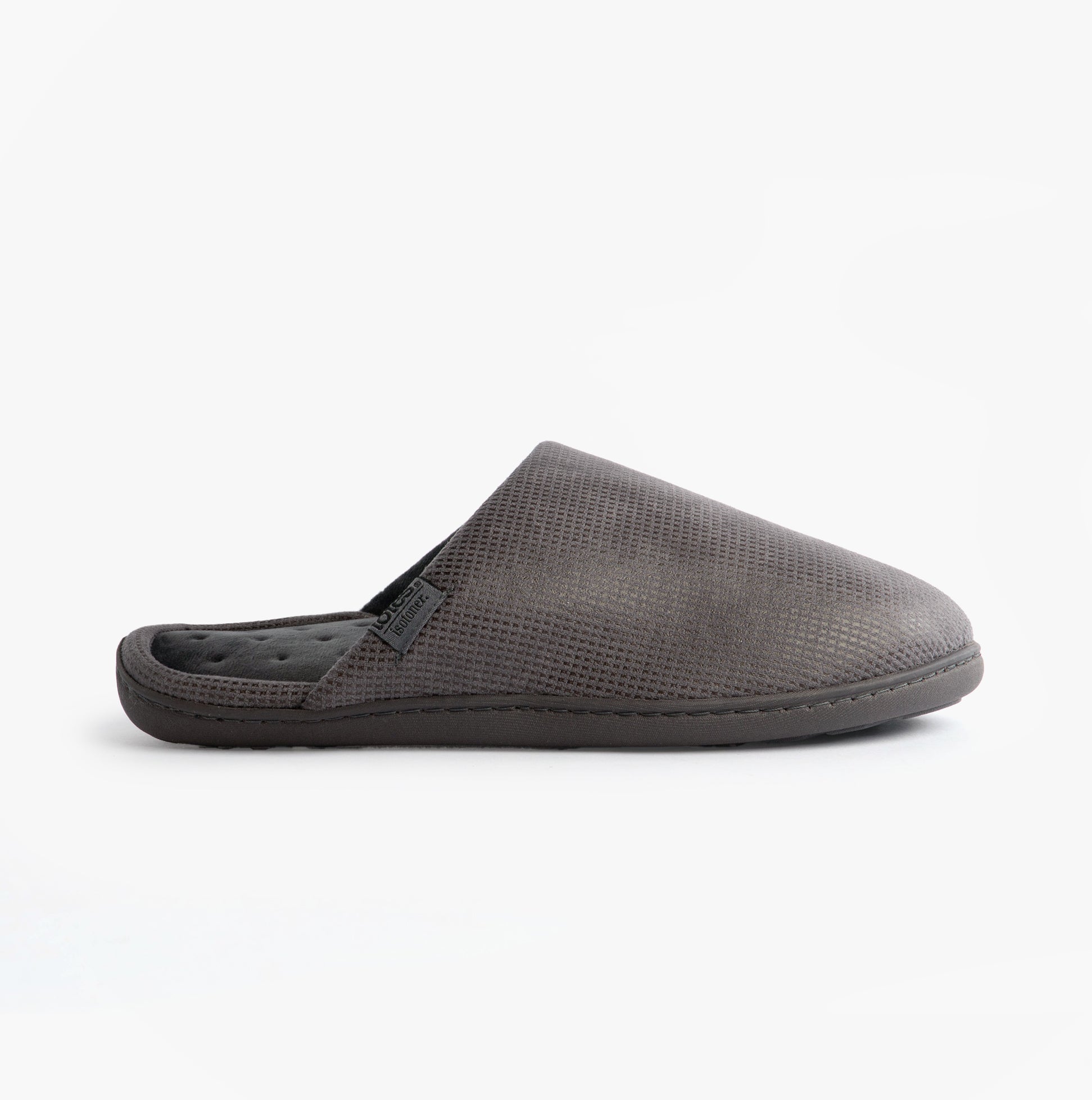 Totes Isotoner SQUARE PATTERNED SMART MULE Mens Mule Slippers Grey side view showcasing slip-on design and textured upper.