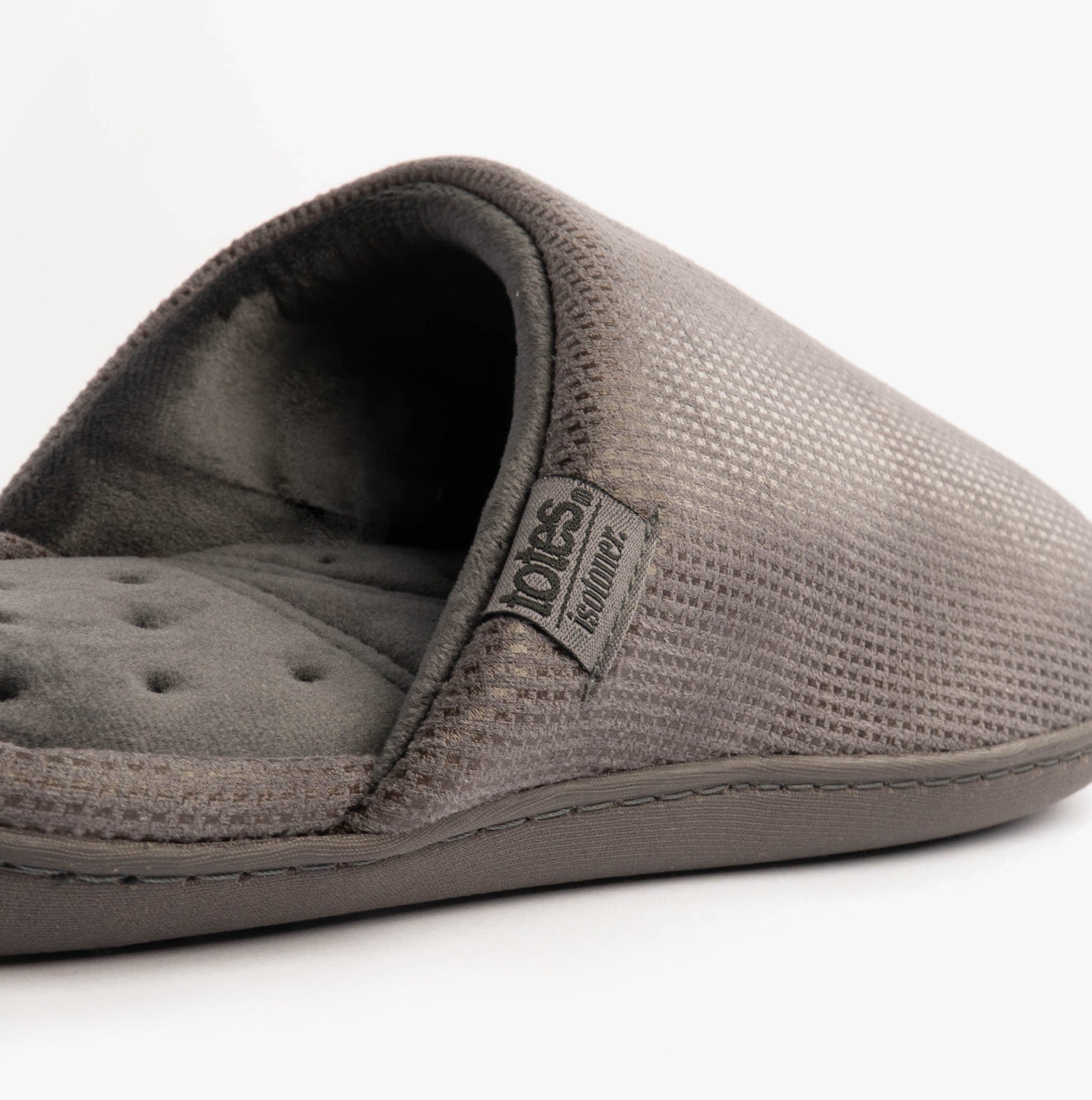 Totes Isotoner SQUARE PATTERNED SMART MULE Mens Mule Slippers Grey side view showcasing textured upper and padded footbed.
