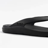 Totes Sol Bounce 0350FBLK Womens Toe Post Sandals Black side view showing lightweight synthetic upper and flat sole.