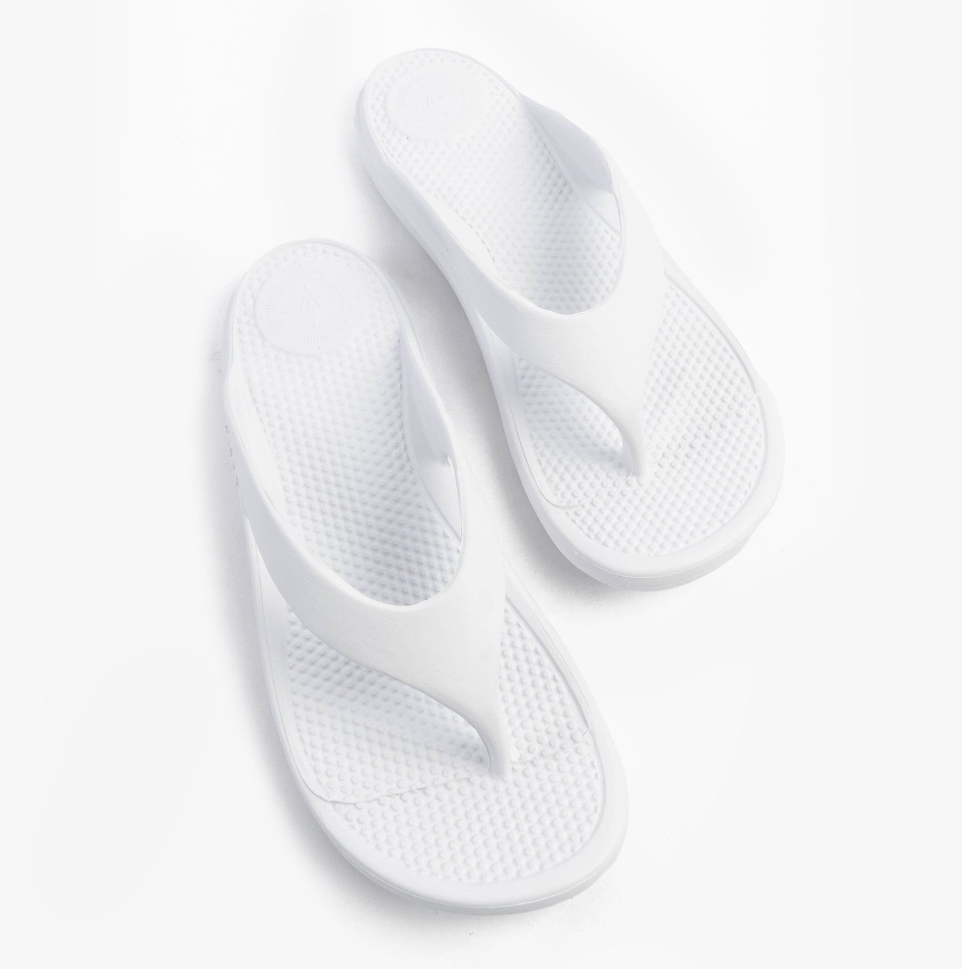 Totes Sol Bounce 0350FWHI Womens Toe Post Sandals White, top view showing lightweight synthetic material and slip-on design.