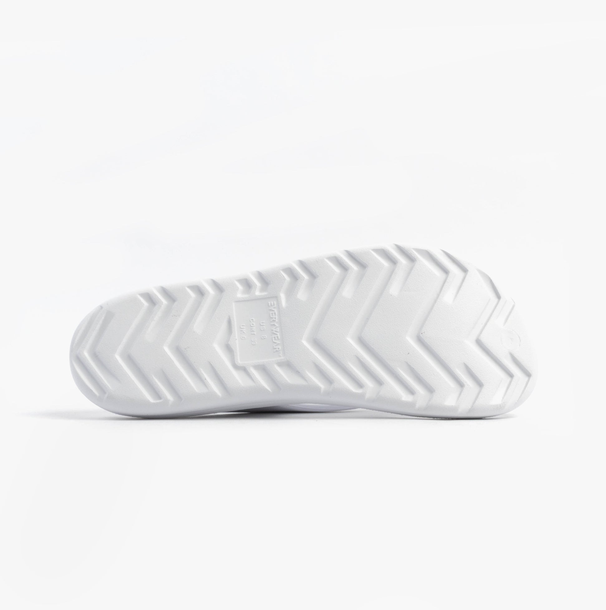 Totes Sol Bounce 0350FWHI Womens Toe Post Sandals White bottom view showing rubber sole with traction pattern.