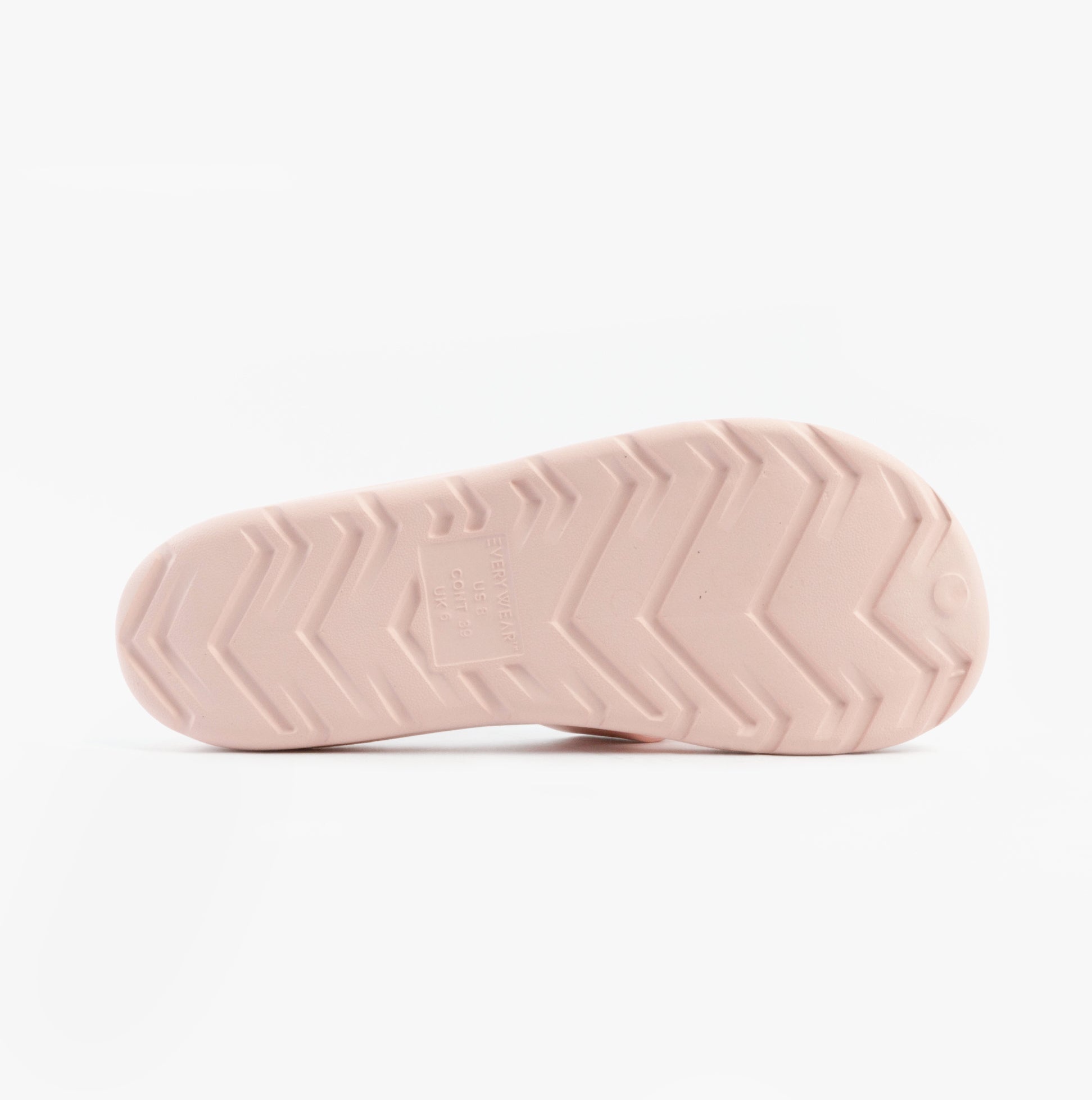 Totes Sol Bounce 0359FSND Womens Cross Slides Evening Sand bottom view showing synthetic rubber sole with zigzag pattern.