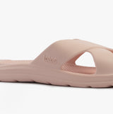 Totes Sol Bounce 0359FSND Womens Cross Slides Evening Sand side view showing lightweight slip-on design in soft pink.