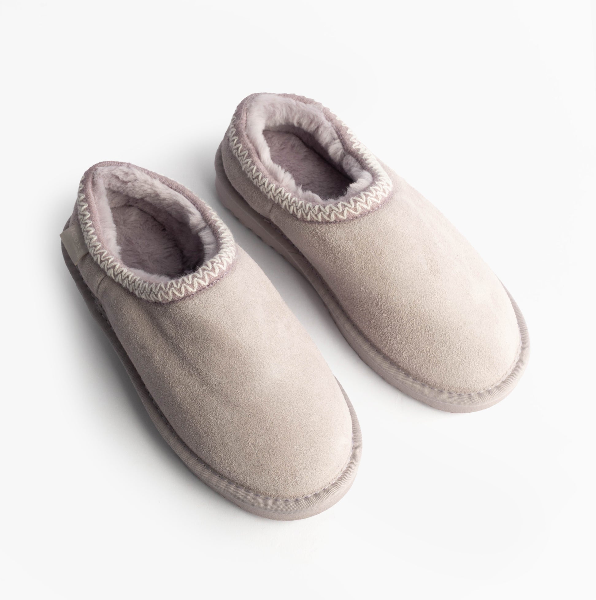 Totes Toasties ICONS SUEDE Shoot Slippers Womens Lilac top view showcasing soft suede and cozy lining