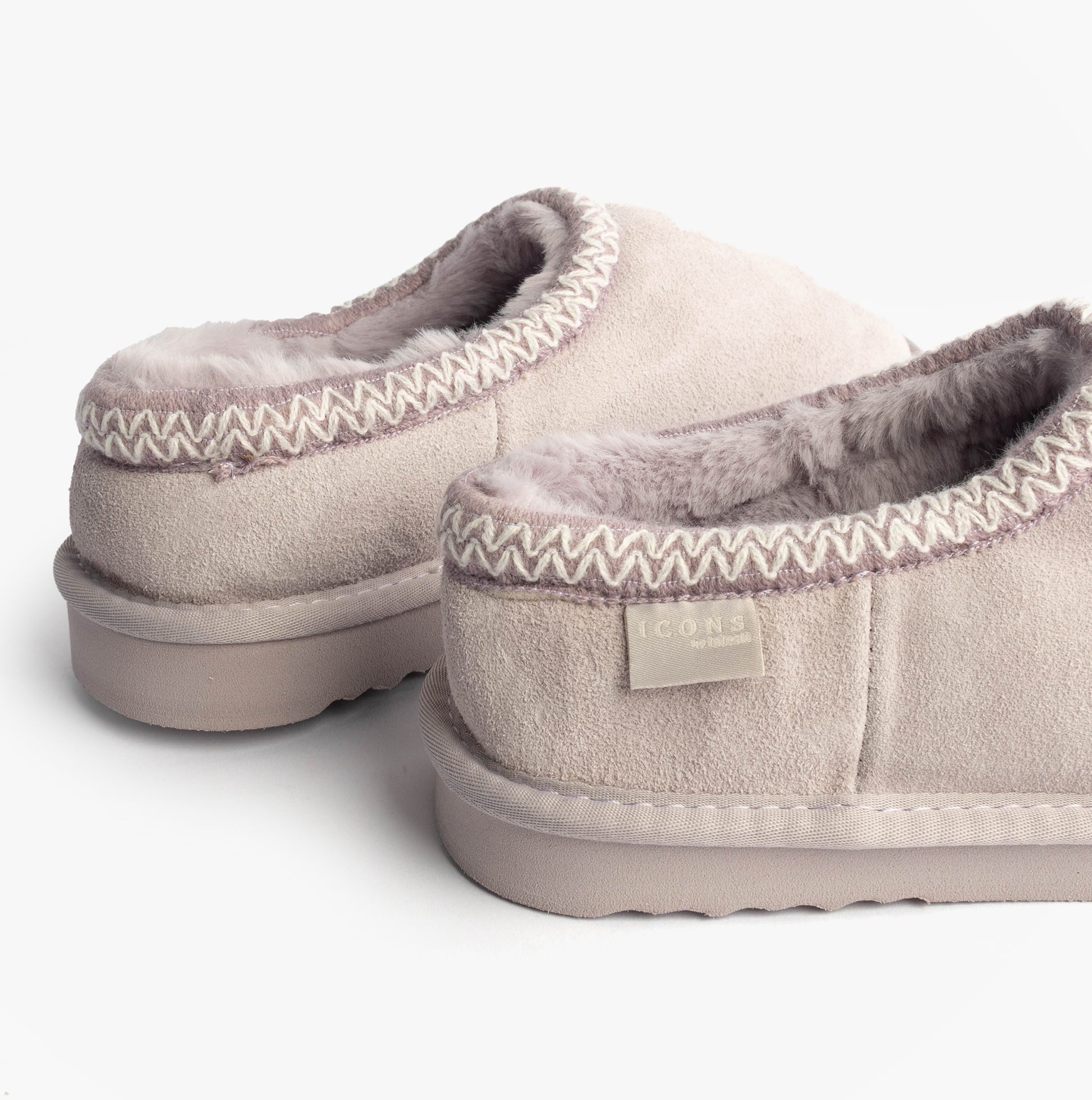 Totes Toasties ICONS SUEDE Shoot Slippers Womens Lilac side view showing suede upper and warm lining features.