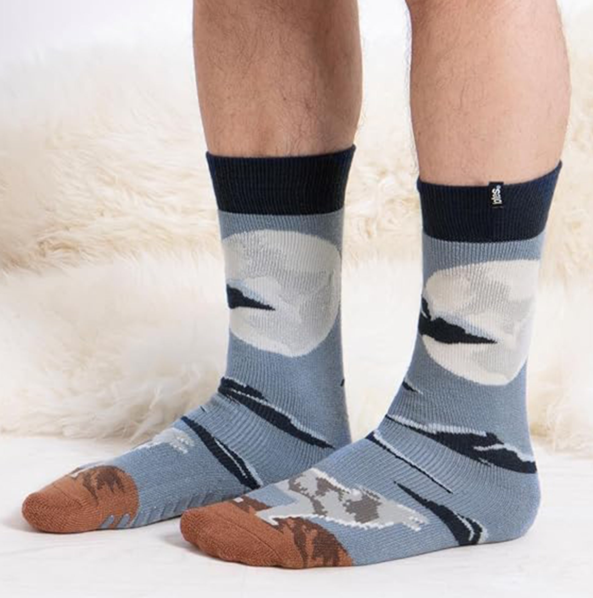 Totes Toasties ORIGINAL NOVELTY SLIPPER SOCKS Mens Socks Wolf side view displaying detailed wolf pattern in blue and brown.