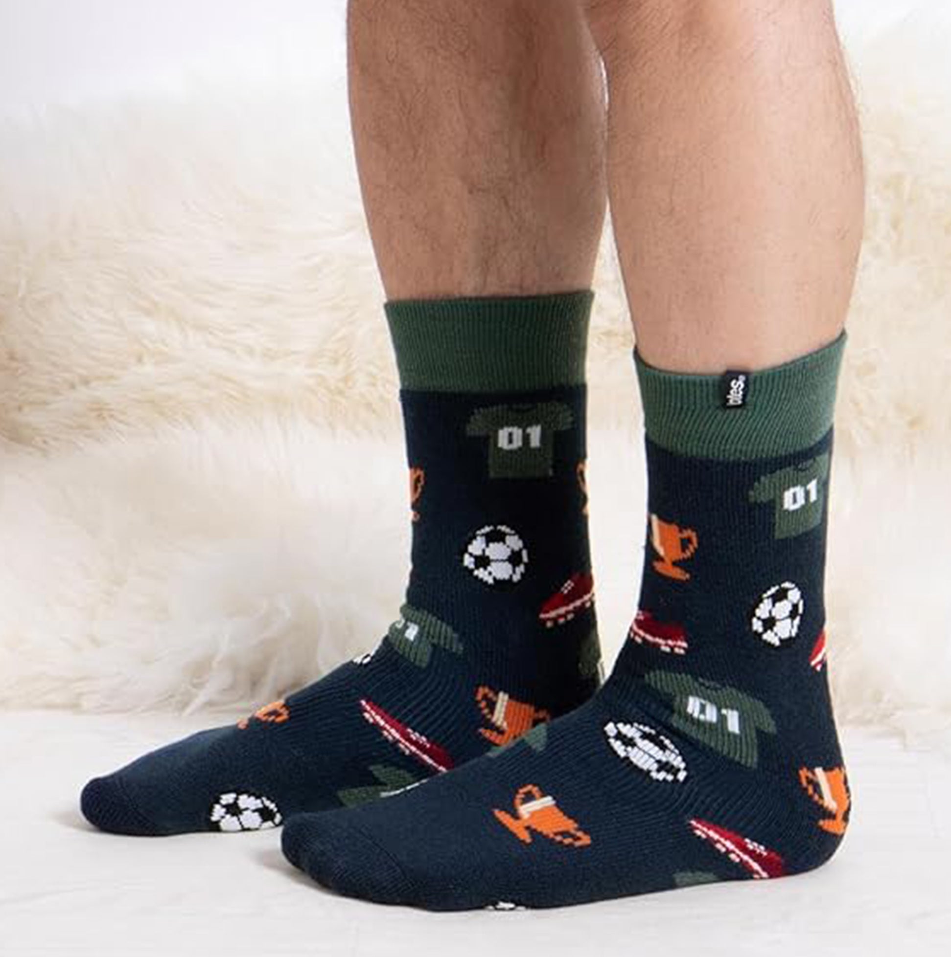 Totes Toasties ORIGINAL SLIPPER SOCKS (TWIN PACK) Mens Socks Football / Stripe side view showing novelty design with football motifs.