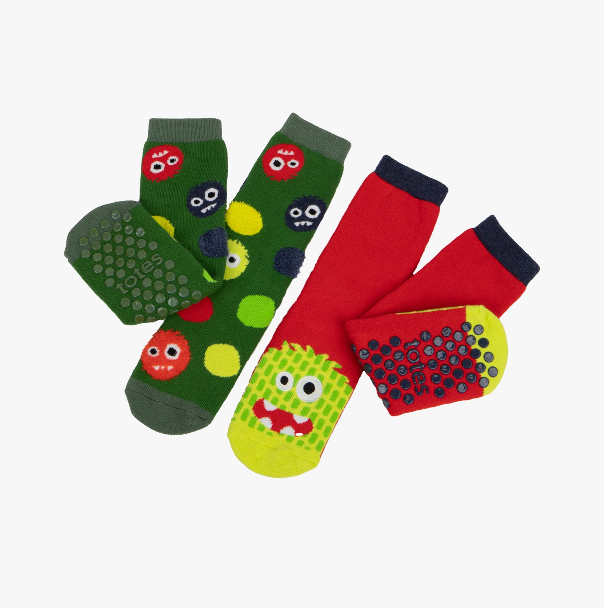 Totes Toasties ORIGINAL Slipper Socks (Twin Pack) Unisex Kids Socks Monster in green and red with character designs, side view.