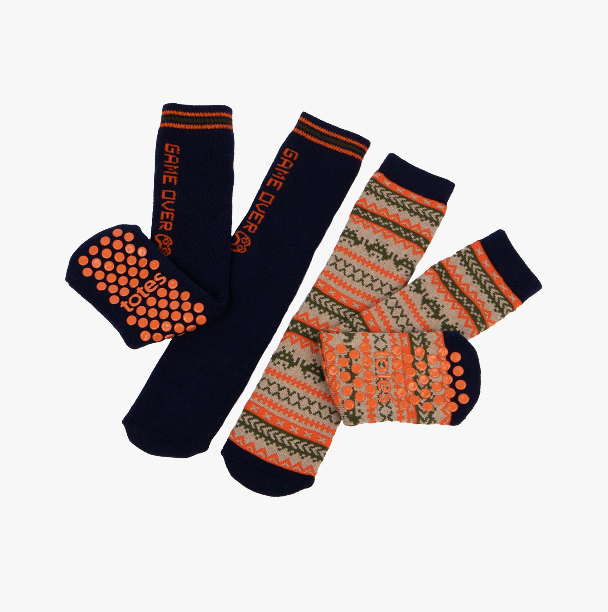 Totes Toasties ORIGINAL Slipper Socks (Twin Pack) Unisex Kids Socks Game, front view showing fun football designs and slip-resistant tread.