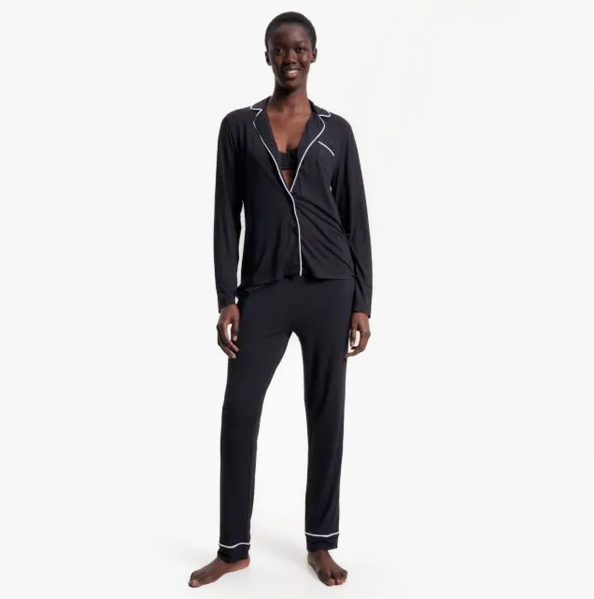Tommy Hilfiger MODAL PYJ PANT WIPIPING Womens Pants Black front view model wearing loungewear pajama set.
